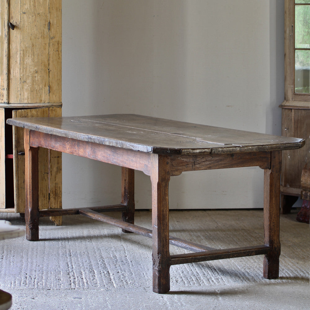 A good side view of the walnut French farmhouse table